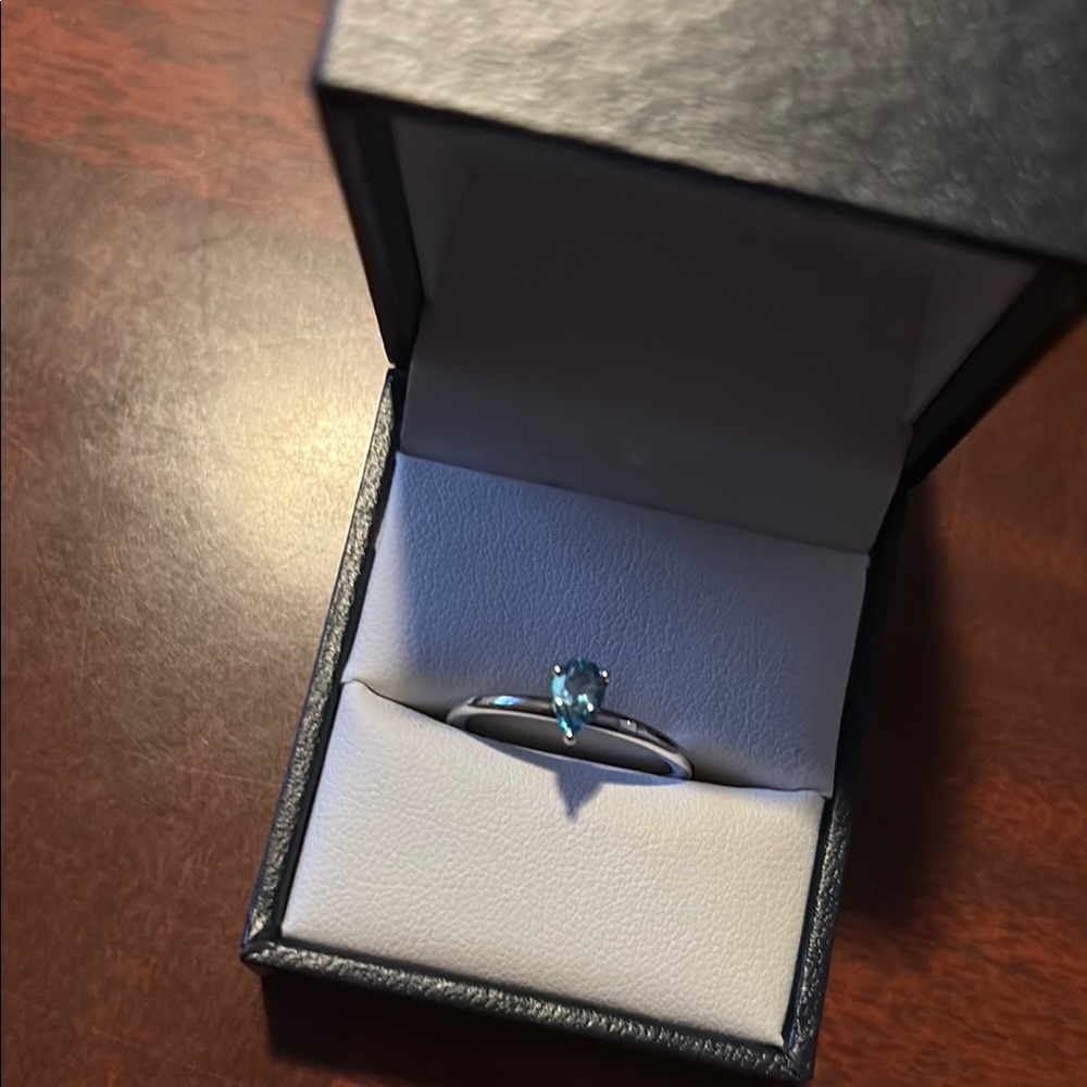 Elegant Sterling Silver Ring with Blue Topaz Gemstone